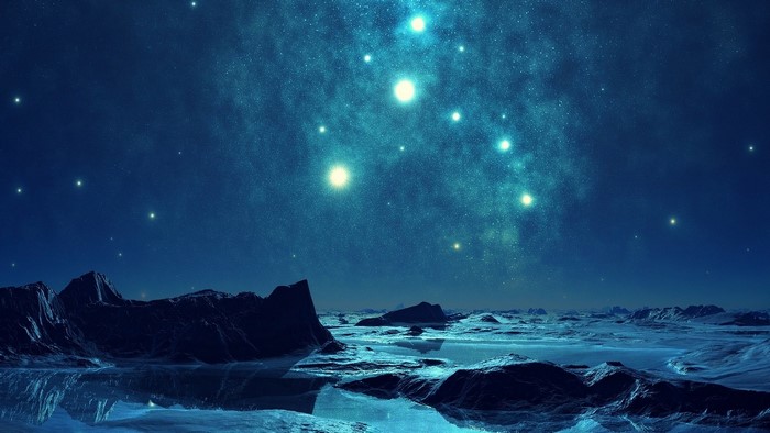Starry night over icy landscape