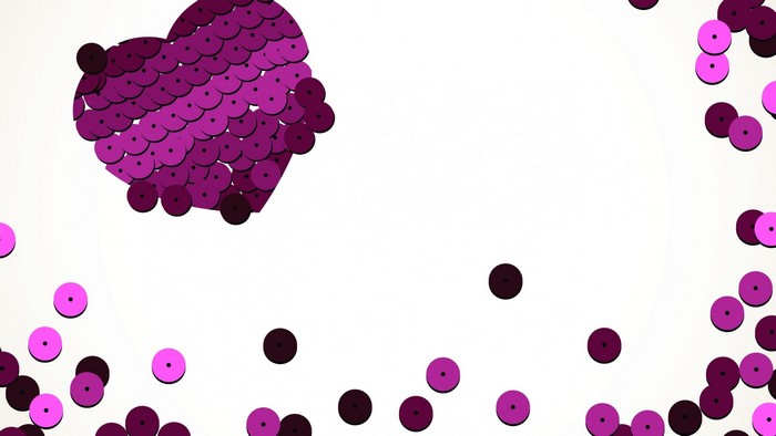 Heart shape made of purple sequins