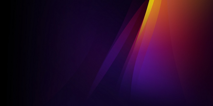 Abstract colorful light streaks on dark background