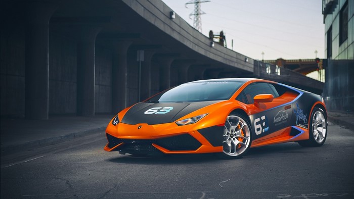Orange Lamborghini Huracan with "63" livery