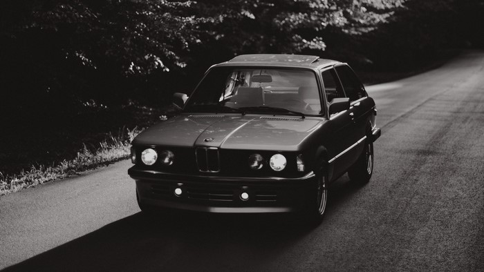 Black and white BMW car on a road