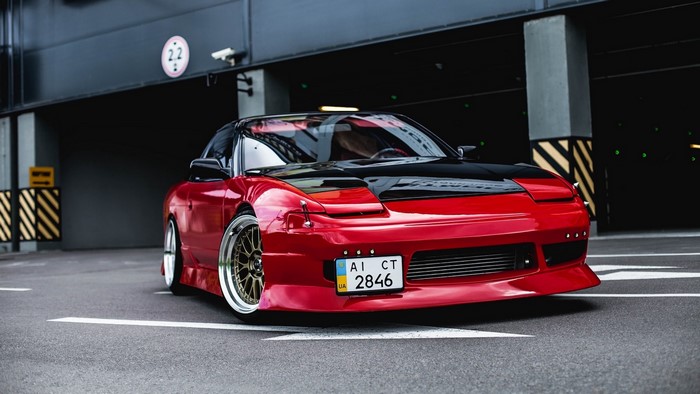 Red Nissan 200sx with custom modifications