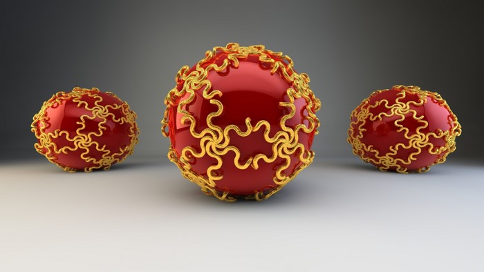 Three red spheres with gold ornate patterns