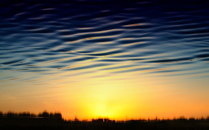 Sunset reflected on rippling water