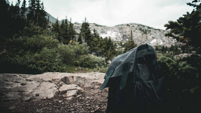 Backpack on a rocky trail in the mountains
