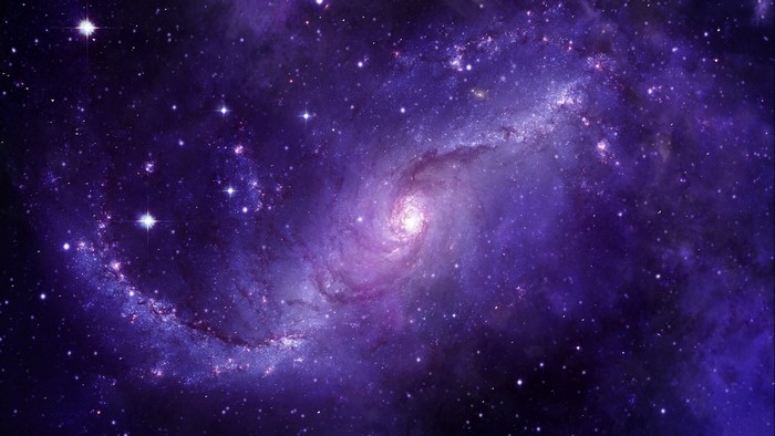 Purple spiral galaxy with stars