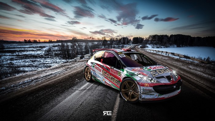 Peugeot 207 rally car on a snowy road at sunset
