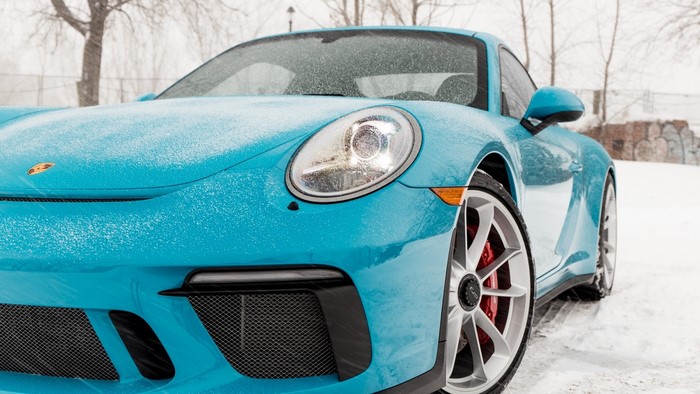 Blue Porsche 911 in Snow