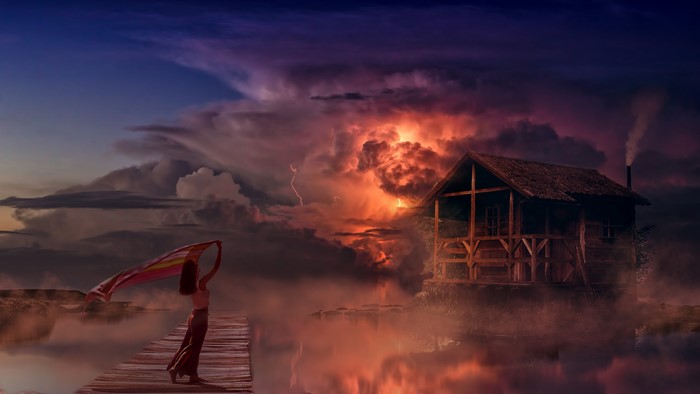 Girl with scarf on pier during thunderstorm
