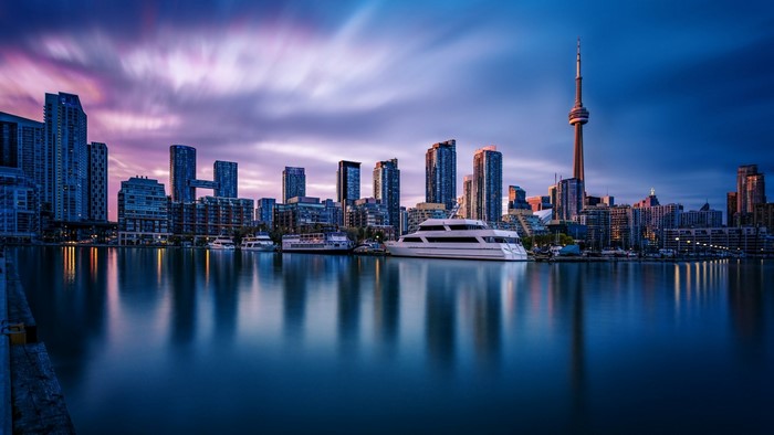 Toronto Skyline with CN Tower and Yachts at Dusk
