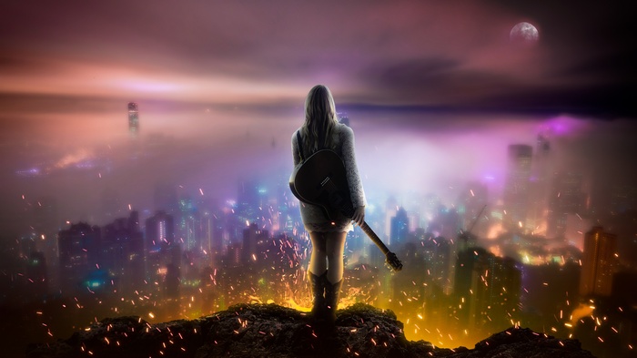 Girl with guitar overlooking a foggy city at night