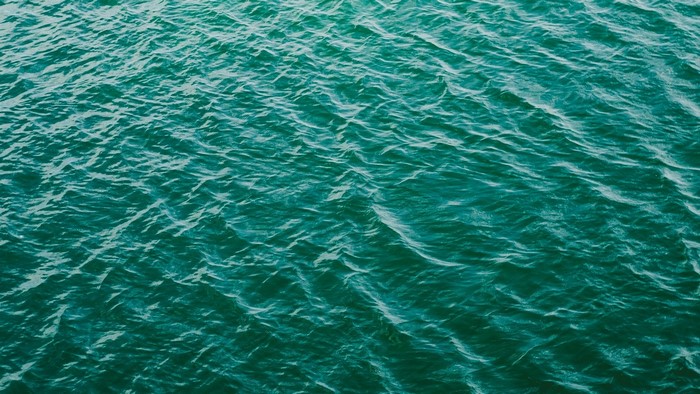 Rippling Teal Water Surface