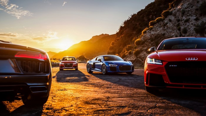 Audi R8 and TTRS cars at sunset