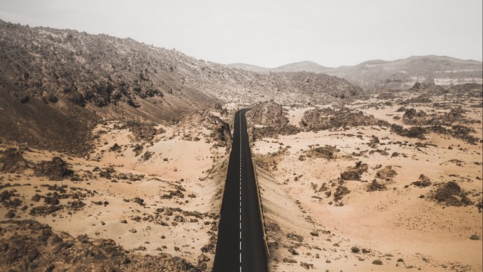 Desert road through rocky terrain