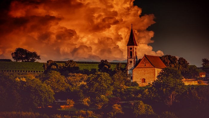 Church in Kaiserstuhl with dramatic clouds