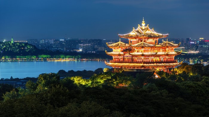 Leifeng Pagoda at night by West Lake, China