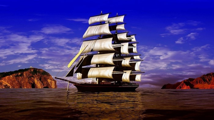 Sailboat sailing on the ocean near rocky islands