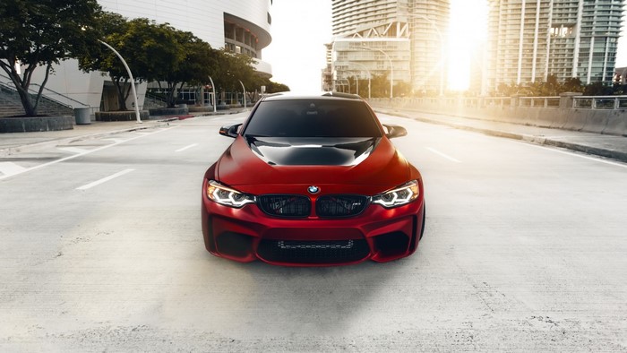 Red BMW M4 Coupe on City Street