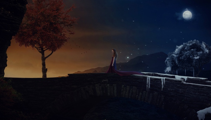 Woman in a dress on a bridge between seasons