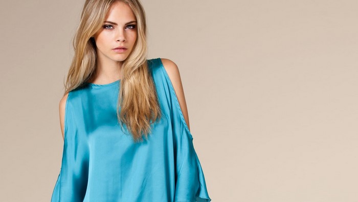Cara Delevingne in a blue top