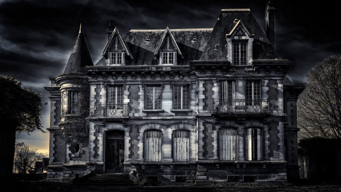 Gloomy old house at night