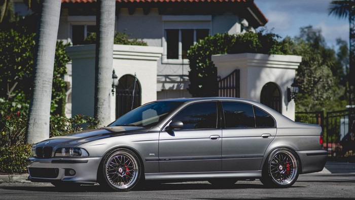 Silver BMW M5 Sedan with Custom Wheels