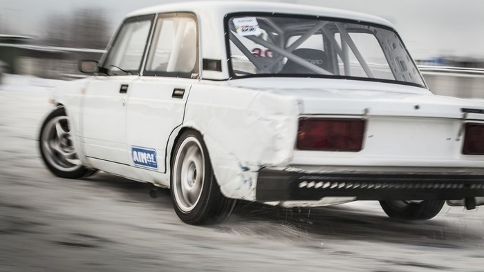 White drift car on a snowy track
