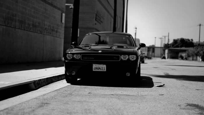 Black Dodge Challenger R/T parked on street