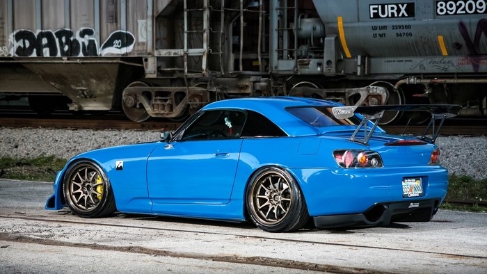 Blue Honda S2000 with large rear spoiler