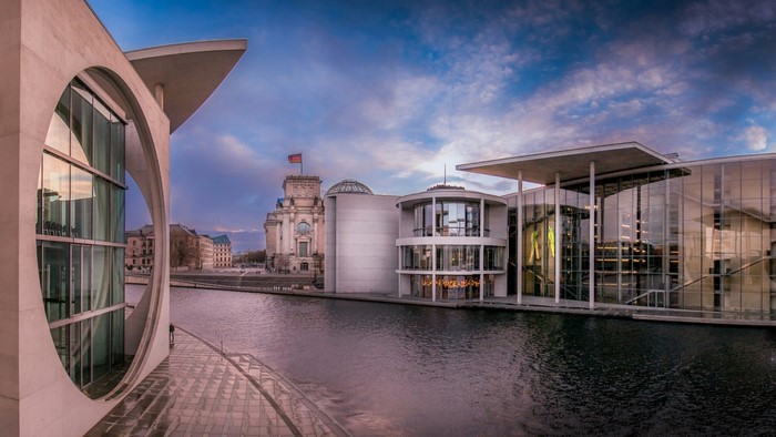 Reichstag Building and modern architecture along the Spree River in Berlin
