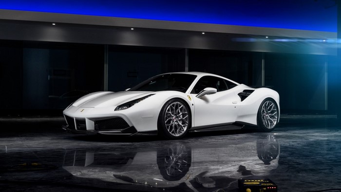 White Ferrari 488 GTB in a modern garage