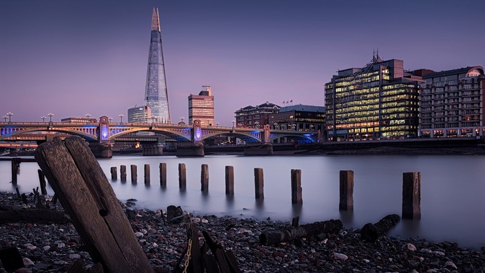 London skyline with The Shard and bridge at dusk