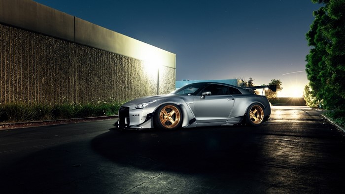 Nissan GT-R with widebody kit and gold wheels