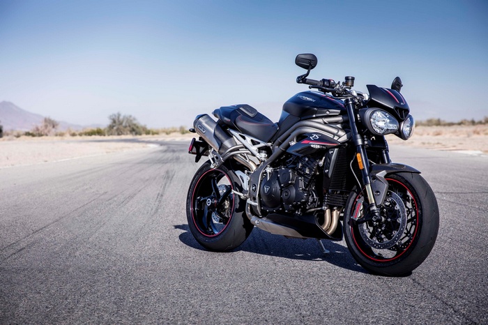 Triumph Speed Triple RS motorcycle on a road