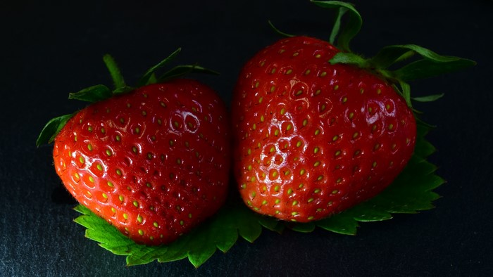 Two Strawberries on a Leaf