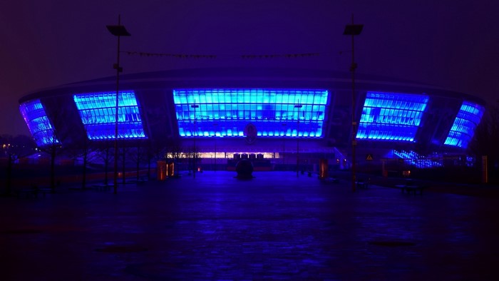 Donbass-Arena illuminated with blue lights at night