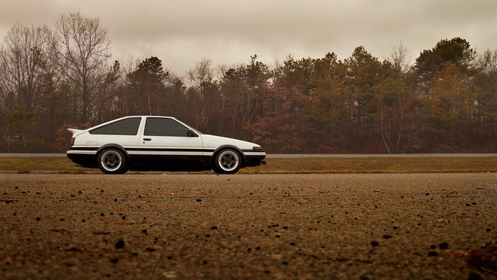 White Toyota AE86 parked on a road