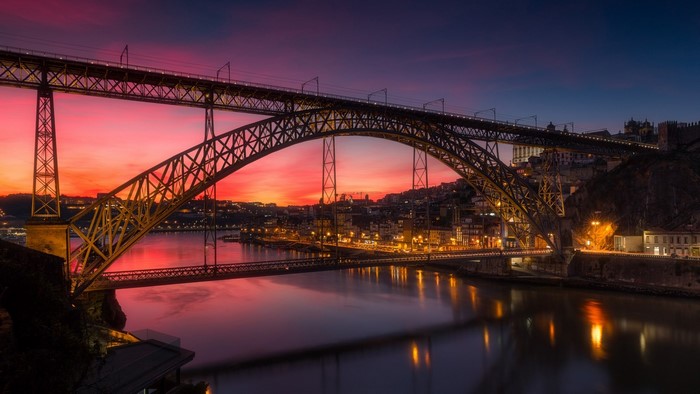 Dom Luís I Bridge over Douro River at sunset, Porto, Portugal