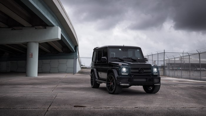 Black Mercedes-Benz G63 AMG under a bridge