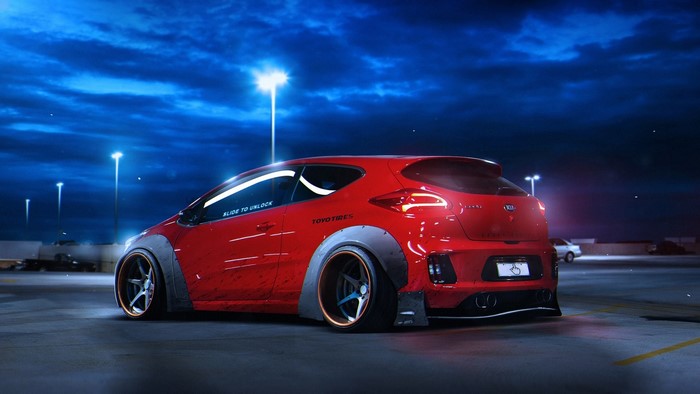 Red Kia Ceed with custom body kit at night
