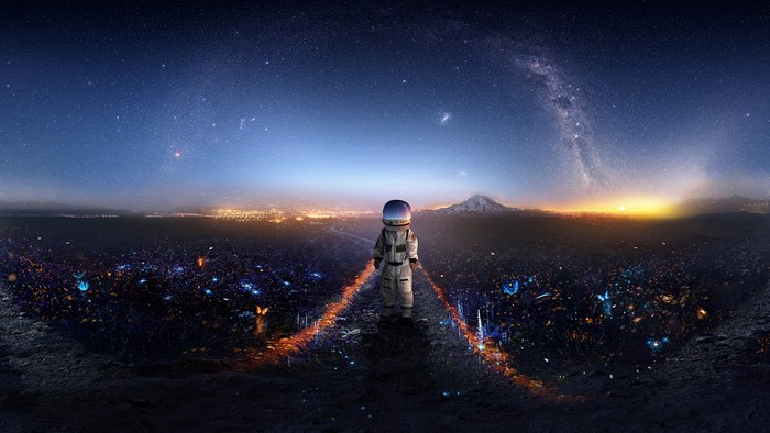 Astronaut standing on a path with city lights and stars
