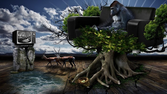 Gorilla on a couch in a tree with gazelles and a TV