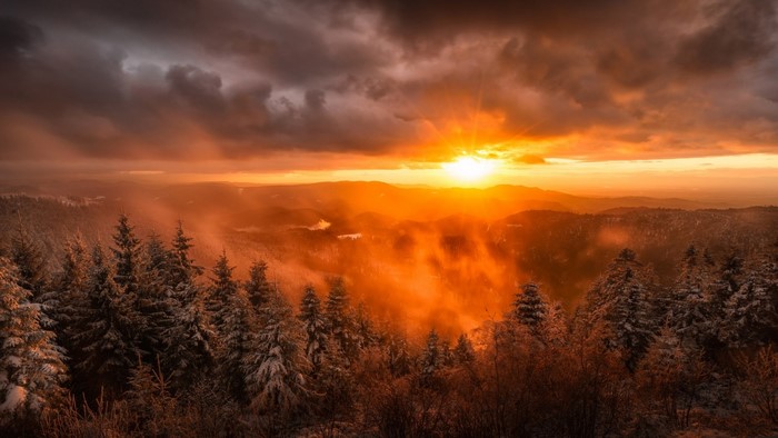 Sunset over snowy Black Forest, Germany