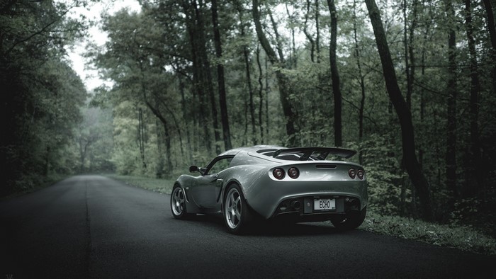 Lotus Exige on a Forest Road