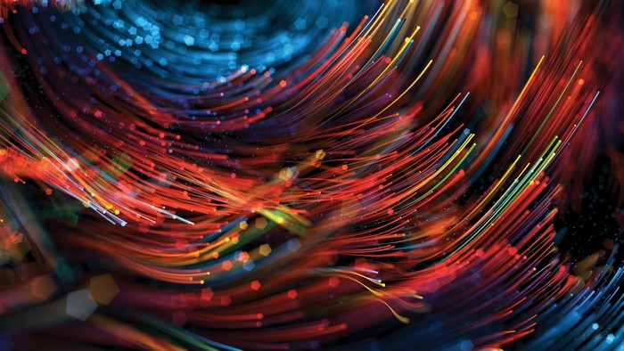 Abstract swirling red and blue light streaks