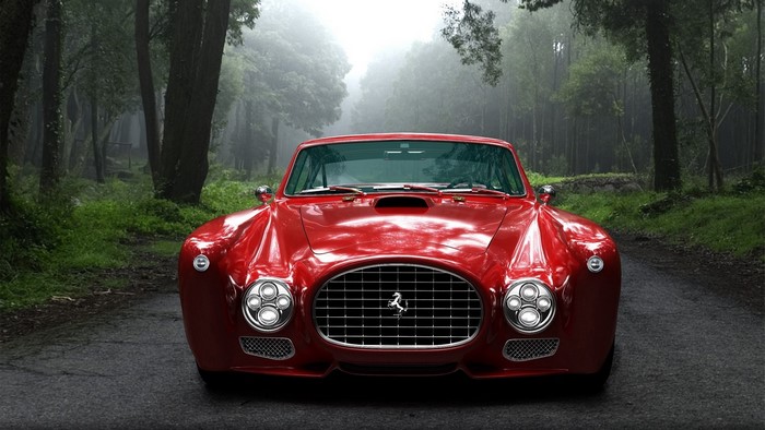 Red Ferrari F 340 Competizione on a forest road