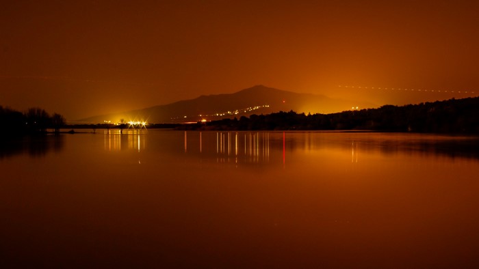 Lake at Dusk with Distant Lights