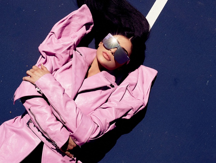 Kylie Jenner in pink coat and sunglasses