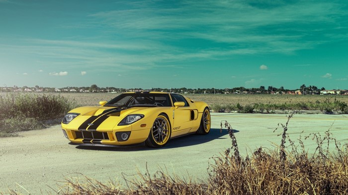 Yellow Ford GT with black stripes