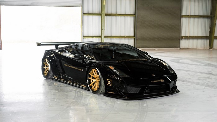 Black Lamborghini Gallardo with gold rims